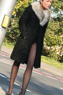 Nylon-X-Files Lady in heavy coat showing her black pantyhose