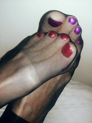 Me in stockings, heels and painted toes. For feet lovers!