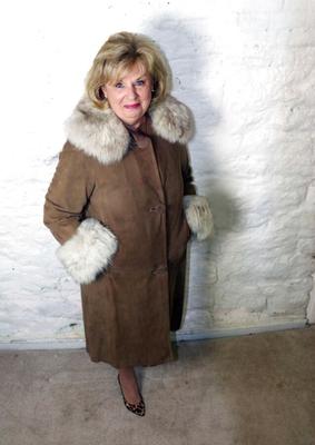 Deb posing in coat