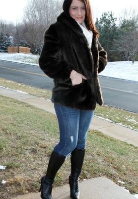 Dark haired beauty in boots, leggings, tights, and jeans