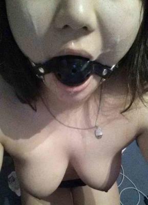 girls accepting ball gag