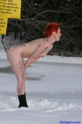 Short red haired amateurs in the snow