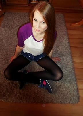 Redhead in sneakers