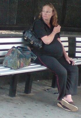 Smoking pregnant dressed