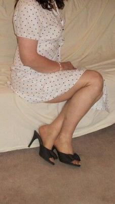 Alice n polka dot dress and bronze pantyhose