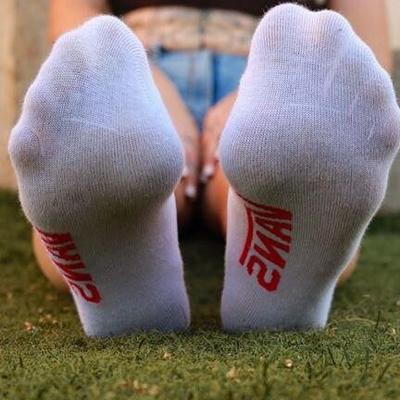 HOT WOMAN&#;S FEET IN SOCKS