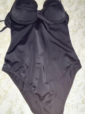 Sister&#;s black one-piece swimsuit