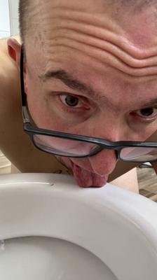 Slave pig has to clean toilet with his tongue