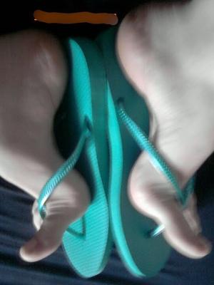 J  Y.O. smelly feet and soles in her green flip flops