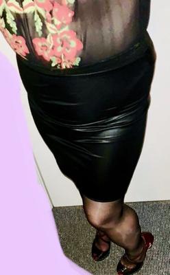 New black skirt, mesh top and pantyhose