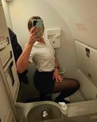 Cabin crew up skirt