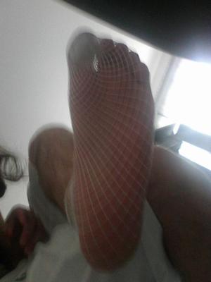 my feet in fishnet socks