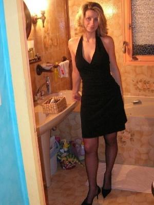 mature posing in black pantyhose