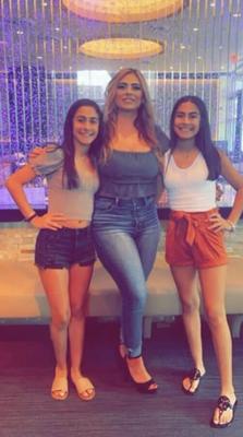 Perfect Latina mom and twin daughters