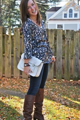 Meek looking brunette chick in boots, tights, skinny jeans