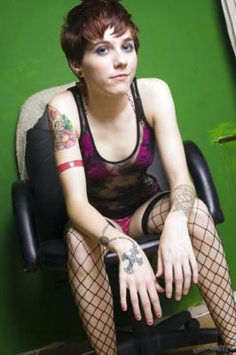 Cute short-haired girl with tattoos