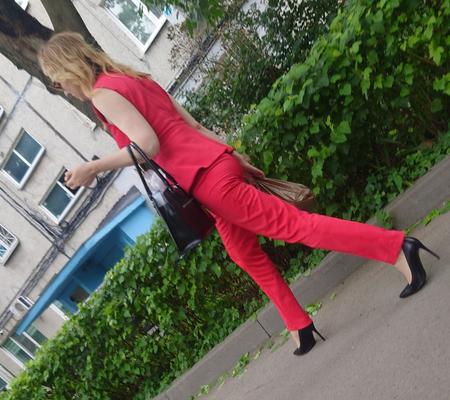 Woman in red and leather heels