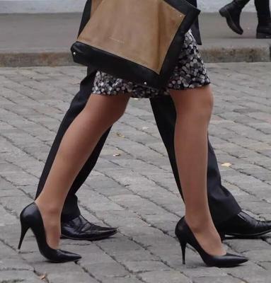 Woman in heels and tan pantyhose