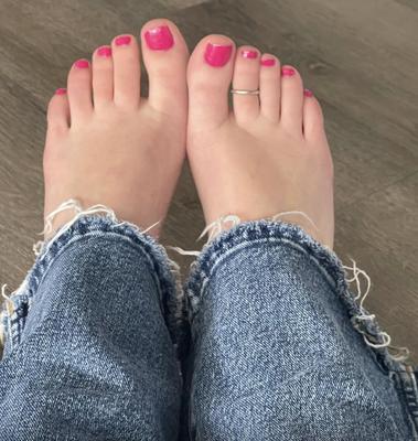 Ash barefoot in jeans