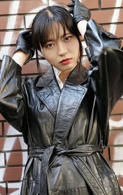 Asian leather coat wearing beauty 